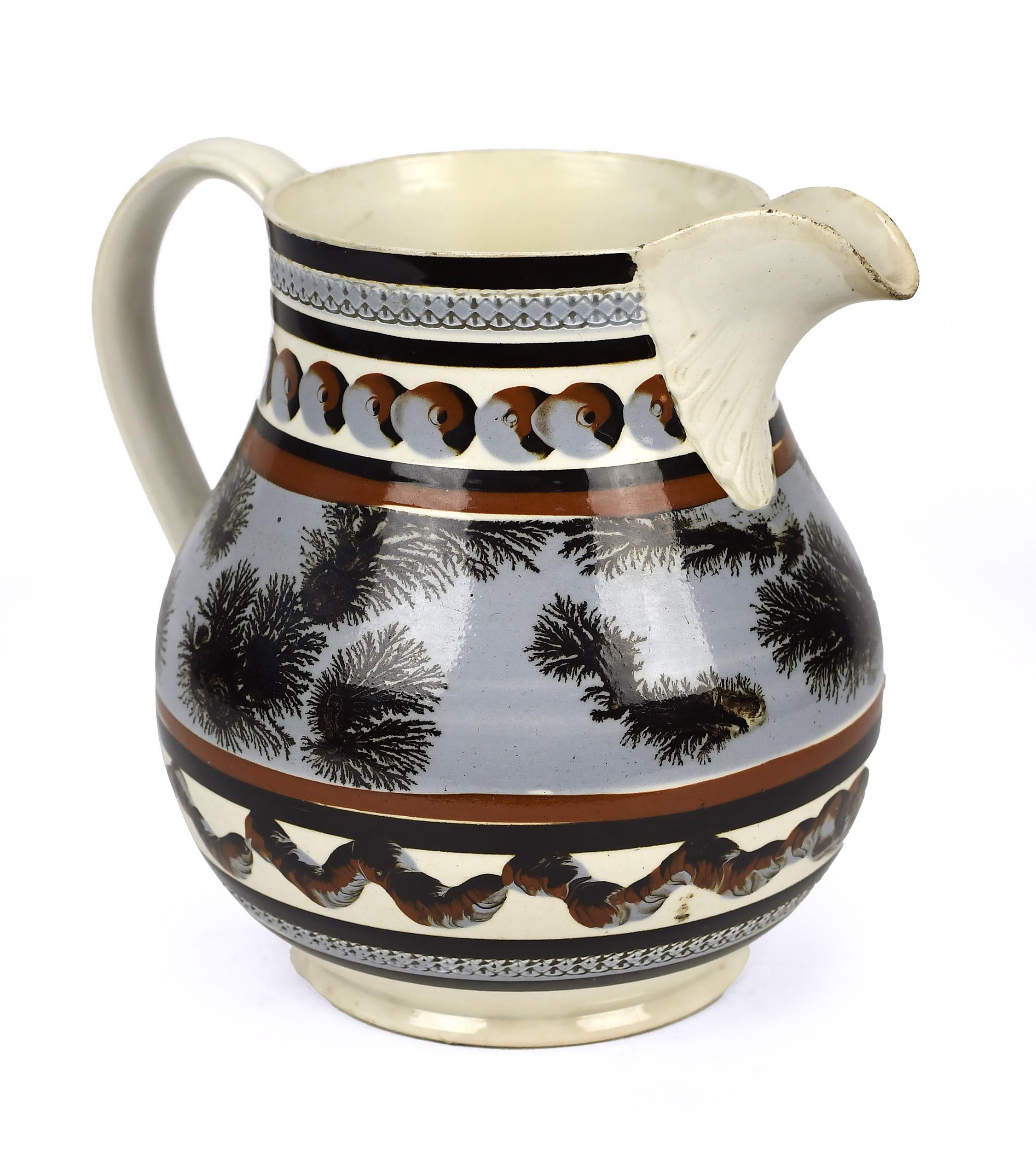 19TH C. MOCHA CREAMWARE POURING PITCHER.