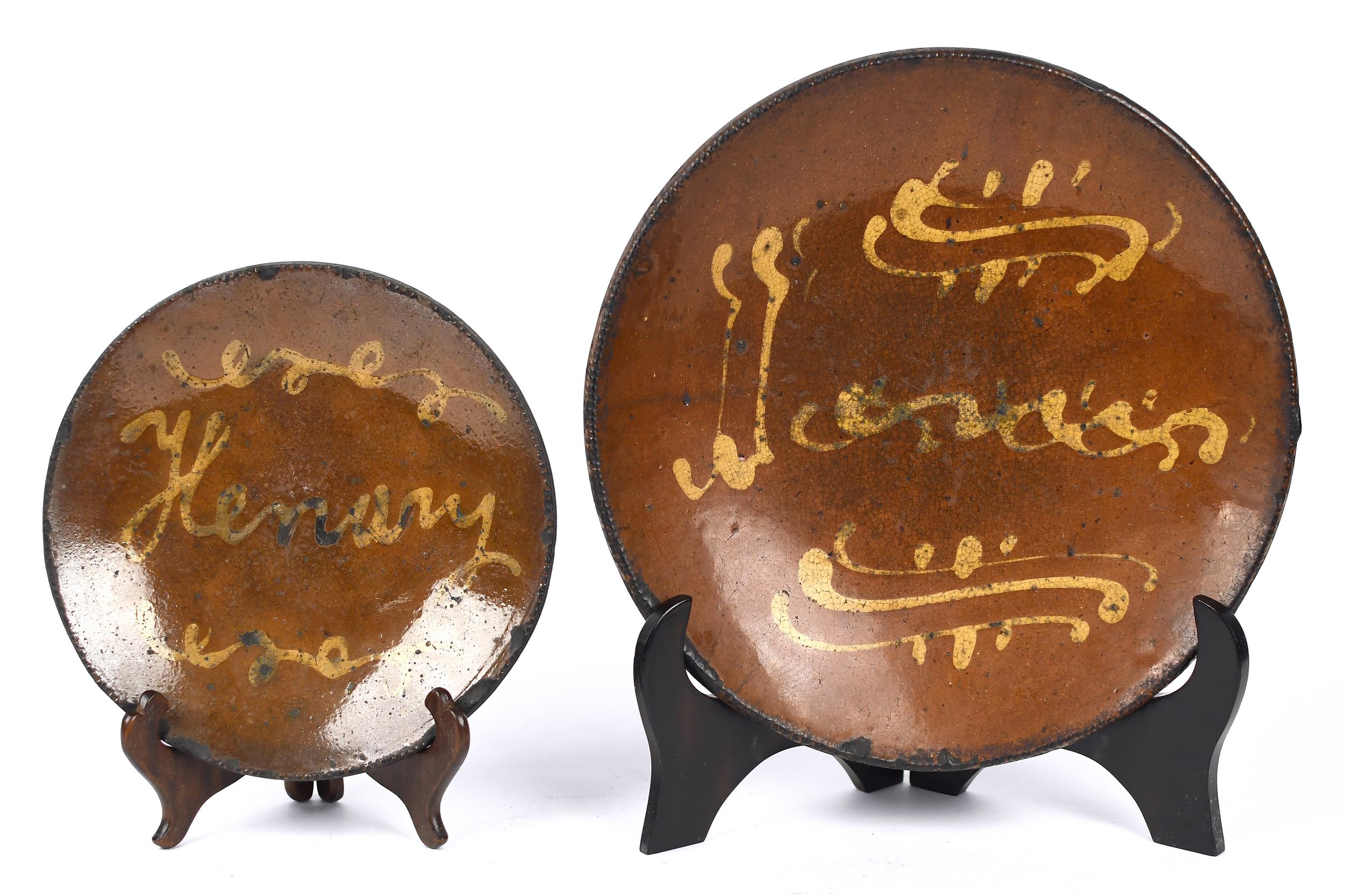 TWO 19TH C. REDWARE PLATES, HENRY.