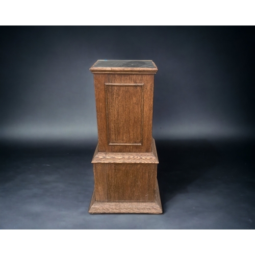 ANTIQUE SLATE TOPPED OAK PEDESTAL STAND.