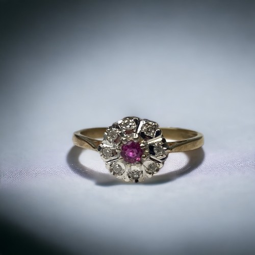 9ct gold ladies diamond and Ruby ring