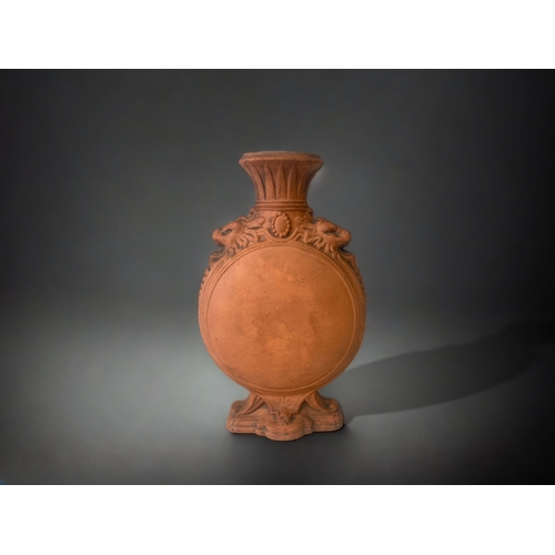 A 19TH CENTURY WATCOMBE POTTERY MOON