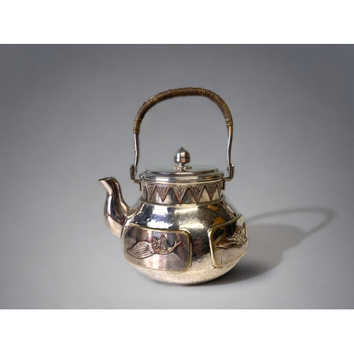 A JAPANESE MIXED METAL TEAPOT.