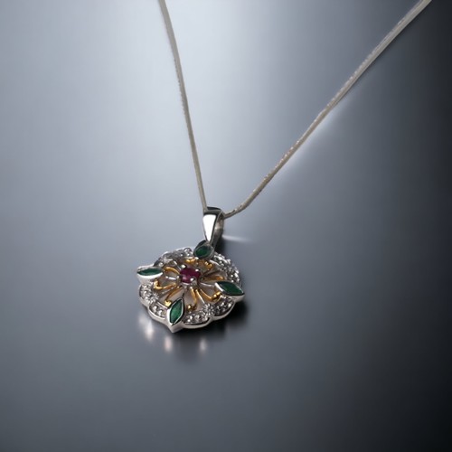 A 9ct White Gold Diamond and Emerald