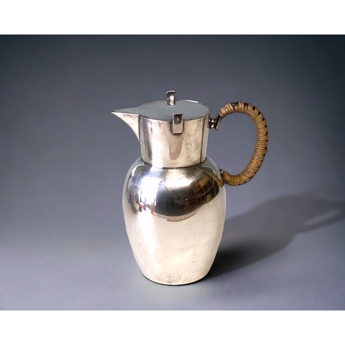 A WMF SILVER PLATED JUG. WITH FLIP-LID