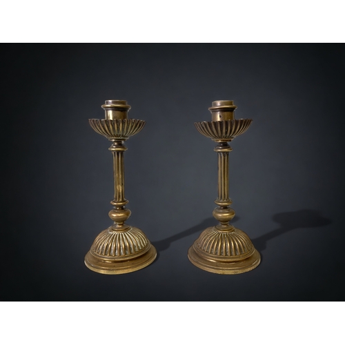 A PAIR OF AESTHETIC DESIGN BRASS