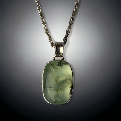 A STERLING SILVER AND PREHNITE