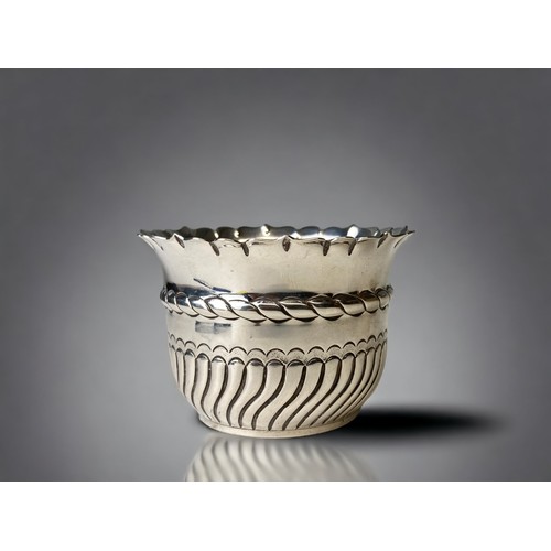 A Solid silver embossed small side bowl.By