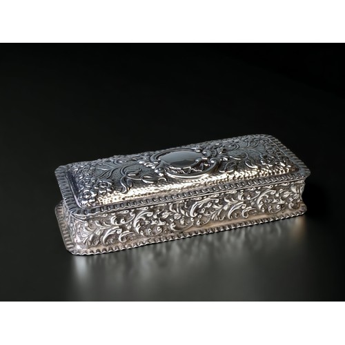 A Silver embossed oblong lidded