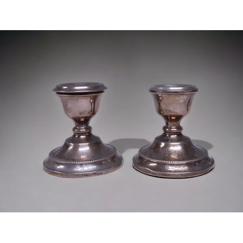 A PAIR OF STERLING SILVER DWARF
