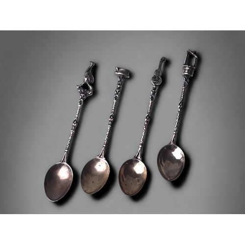 A SET OF FOUR STERLING SILVER SOUVENIR