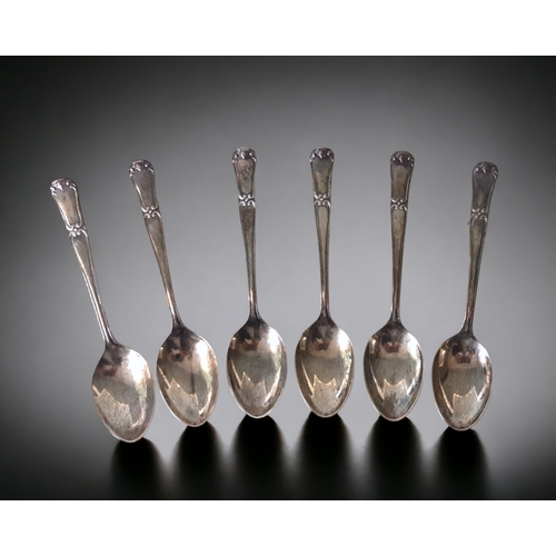 A SET OF SIX STERLING SILVER TEASPOONS.