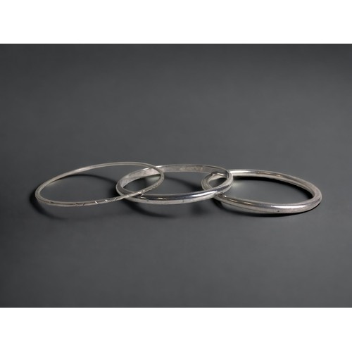 THREE SILVER LADIES BANGLES MARKED 3b08f9