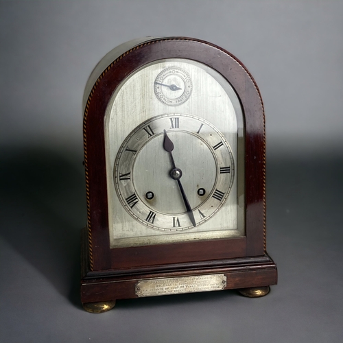 A MAHOGANY CASED MANTLE CLOCK. 8-DAY