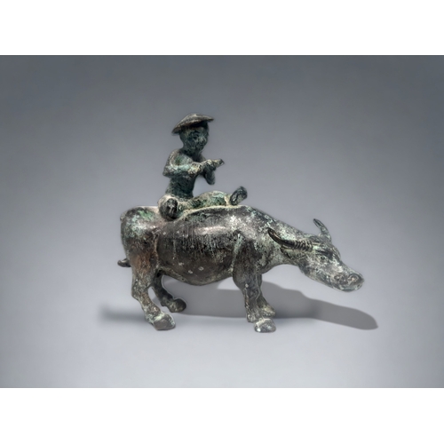 A CHINESE BRONZE FIGURE OF A BOY 3b0934