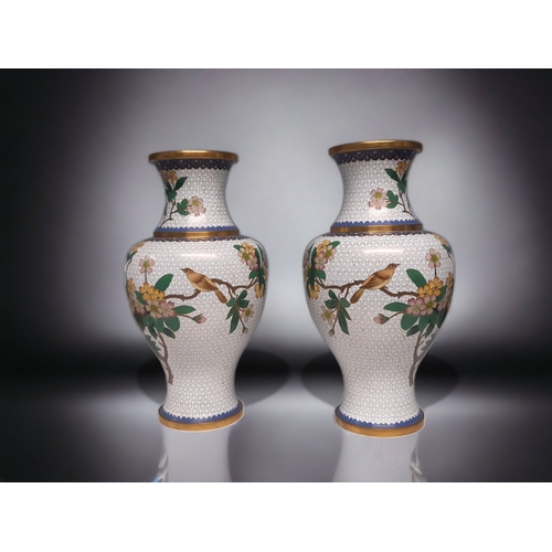 A LARGE PAIR OF CHINESE CLOISONNE VASES.