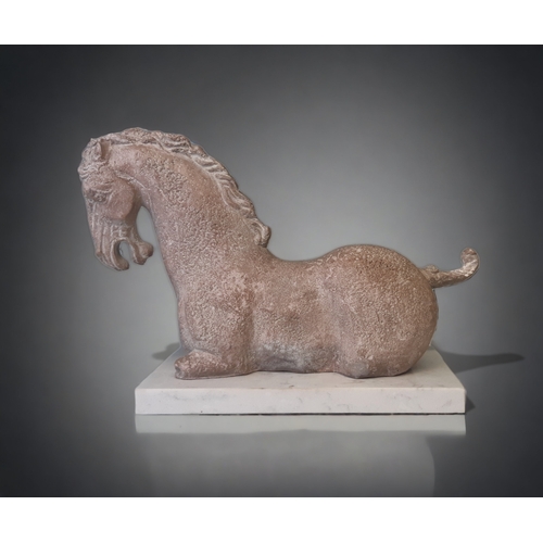 A LARGE CHINESE TERRACOTTA HORSE.IN