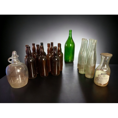 A COLLECTION OF VINTAGE WINE BOTTLES