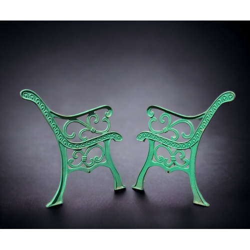 A PAIR OF GREEN PAINTED CAST METAL 3b0994