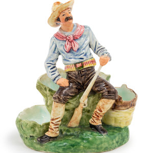 A Ceramic Figurine of a Cowboy
20th