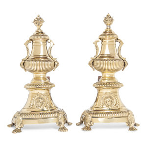 A Pair of English Brass Andirons
Late