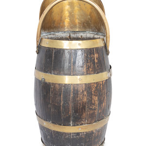 An English Brass Mounted Oak Jug