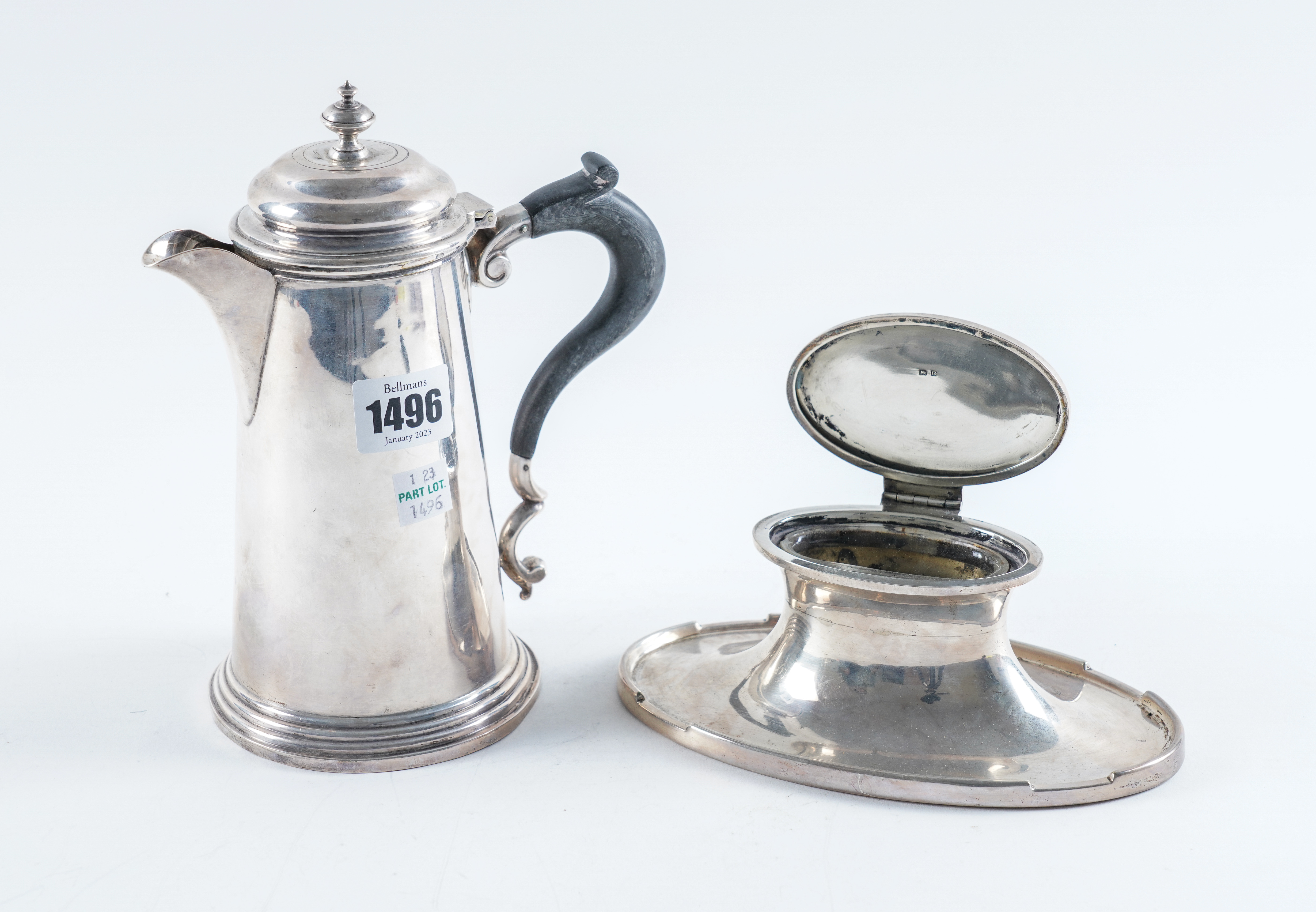 A SILVER HOT WATER JUG AND A SILVER