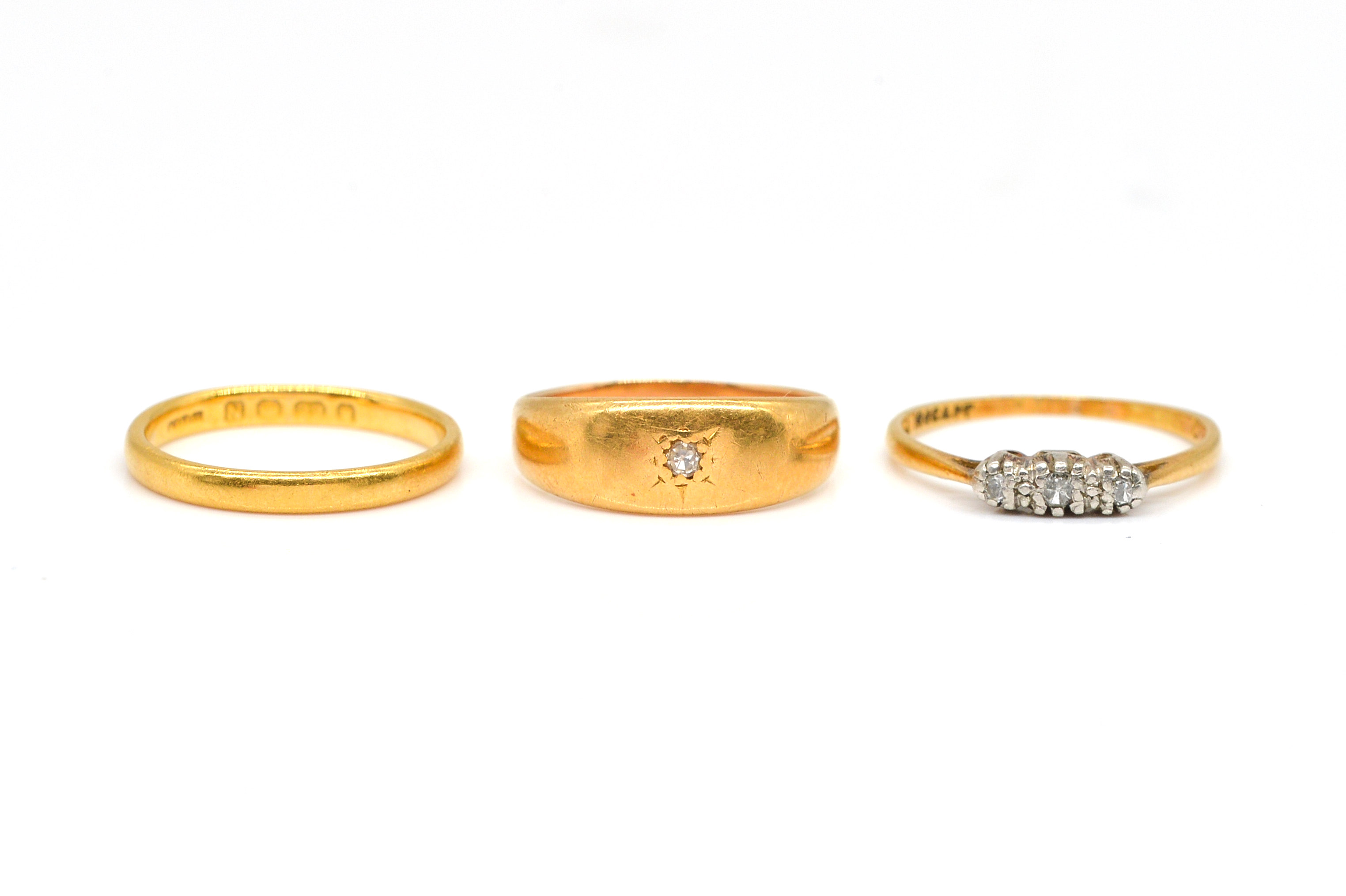 A GOLD AND PLATINUM DIAMOND THREE 3ae64b