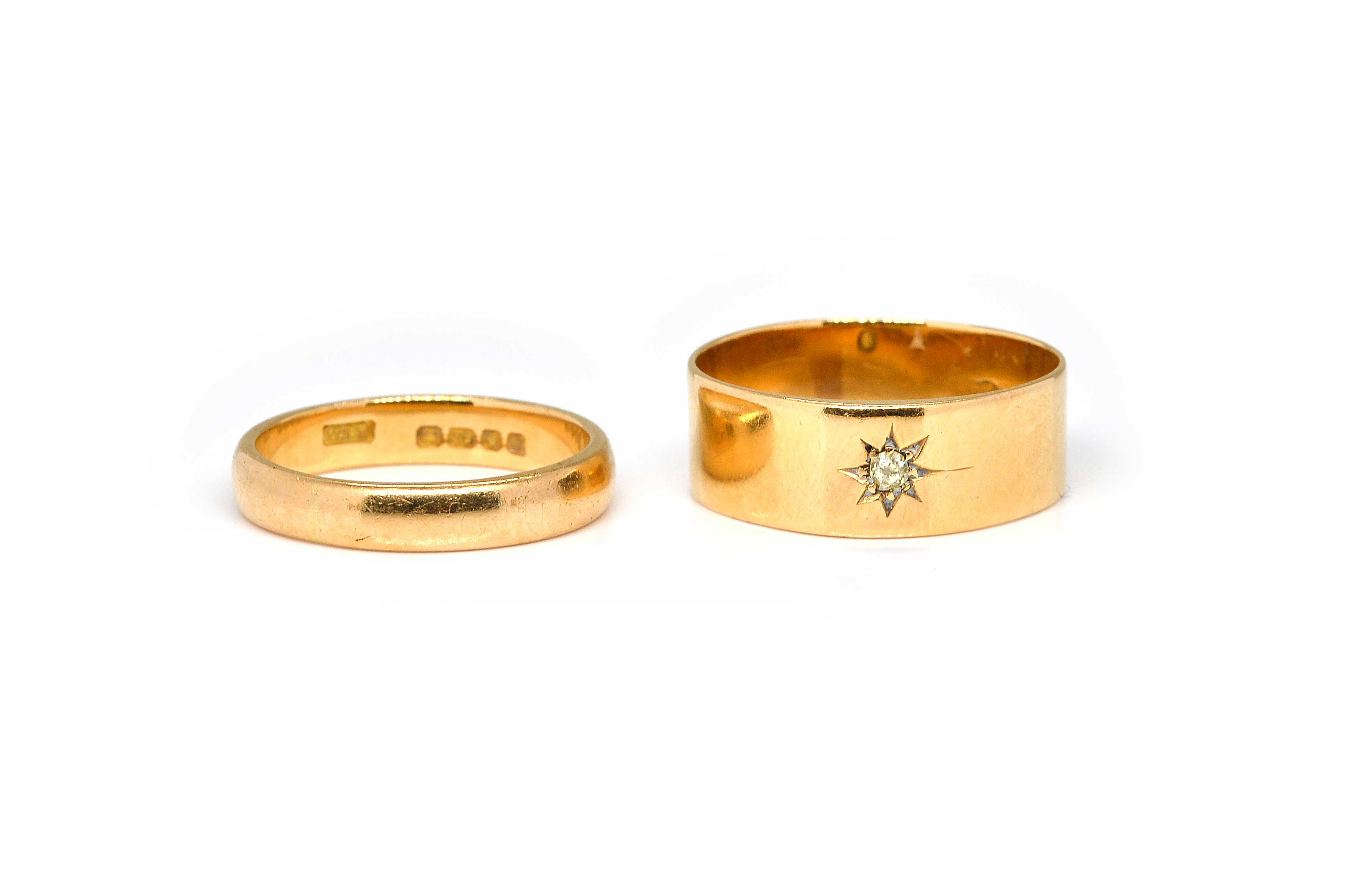 A DIAMOND GYPSY RING AND A GOLD