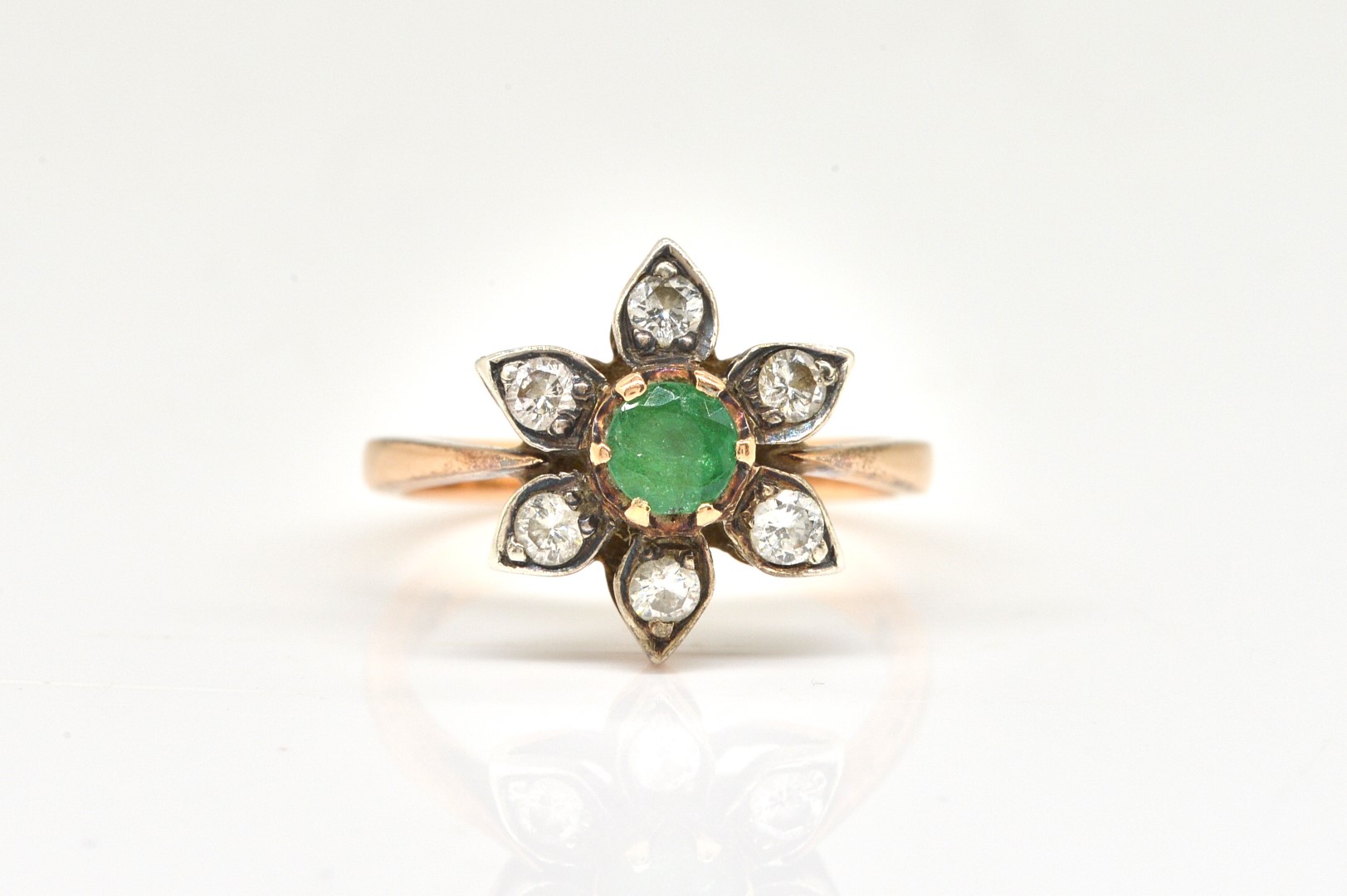 A GOLD EMERALD AND DIAMOND FLOWER 3ae694