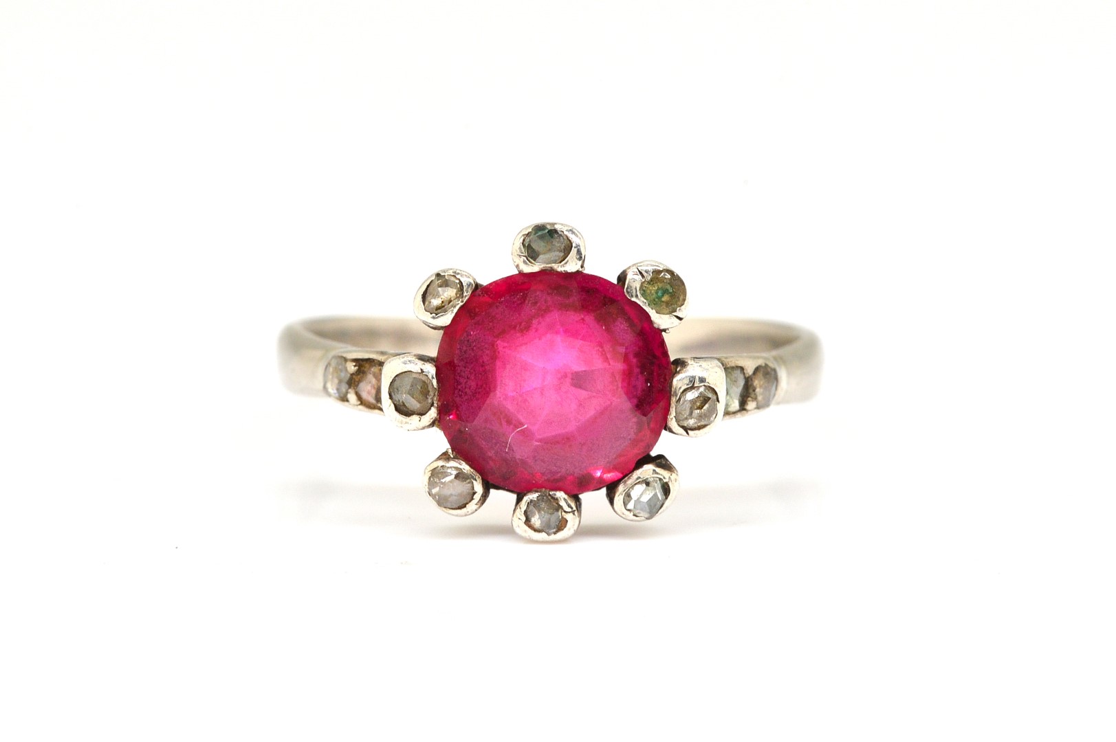 A SYNTHETIC RUBY AND DIAMOND RING