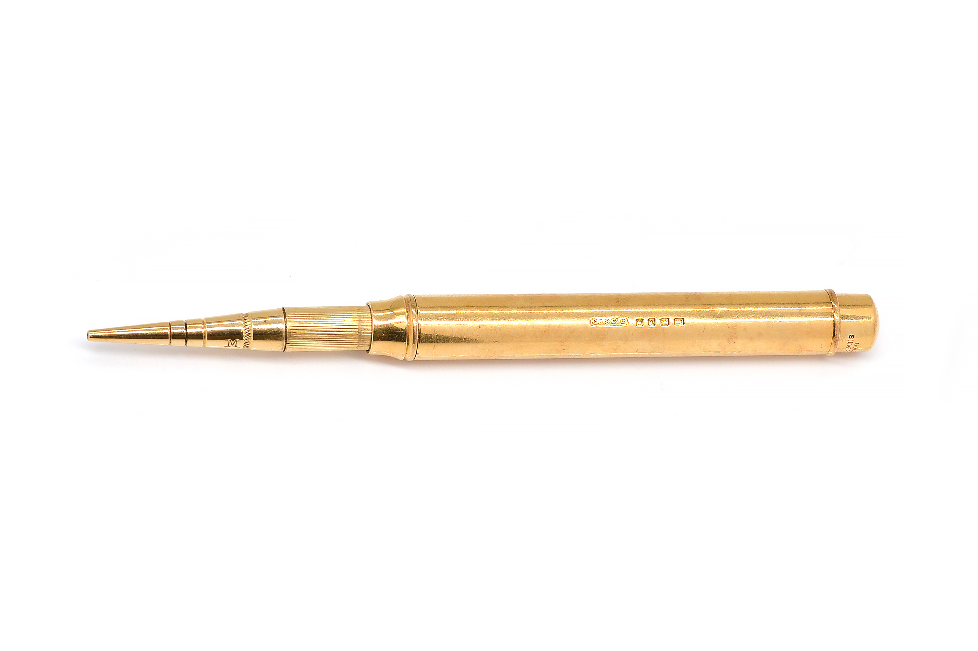 AN 18CT GOLD CASED DROP ACTION PENCIL