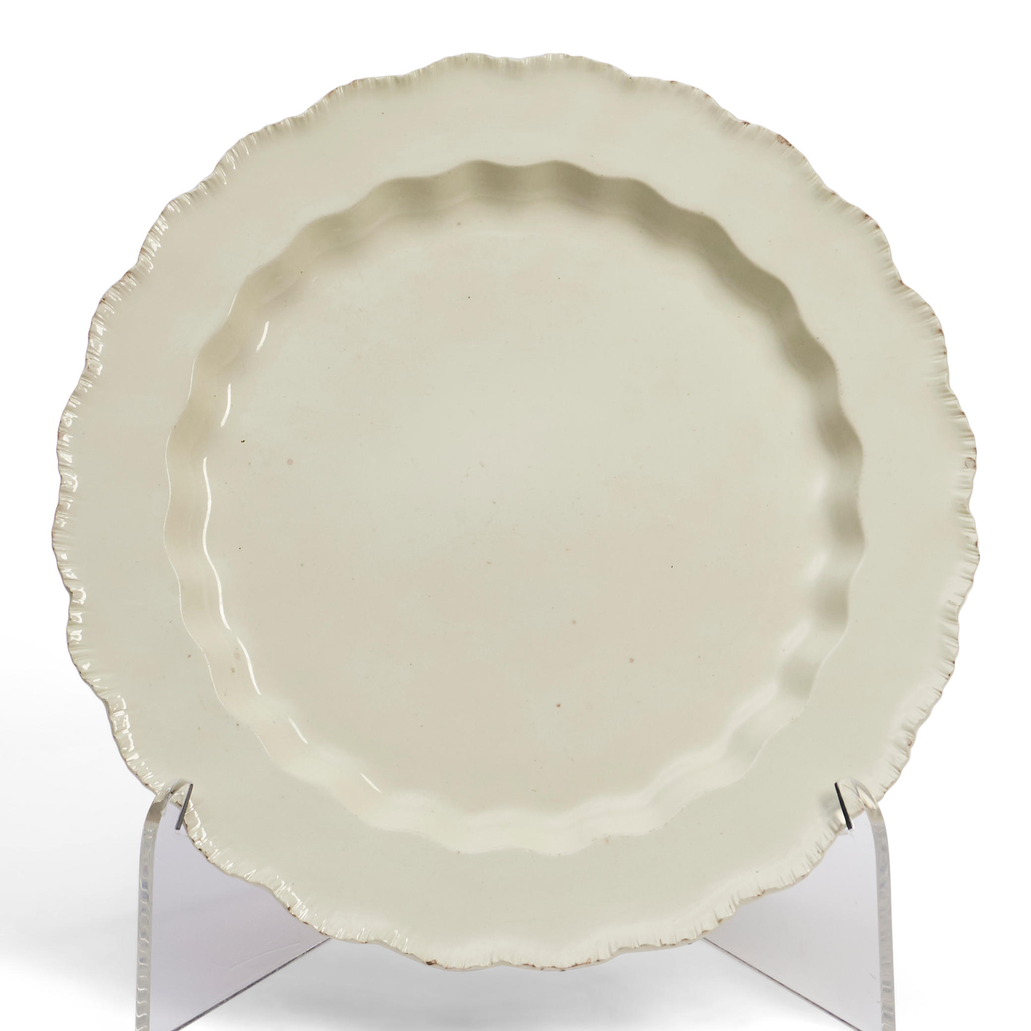 SHELL-EDGED CREAMWARE CHARGER,