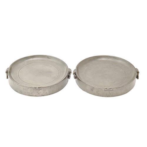 A pair of George III pewter circular