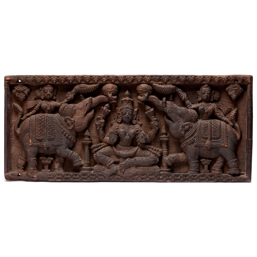 Indian sculpture. A carved wood panel
