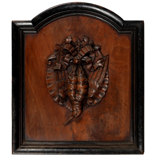 A pair of mahogany trompe lœil carvings