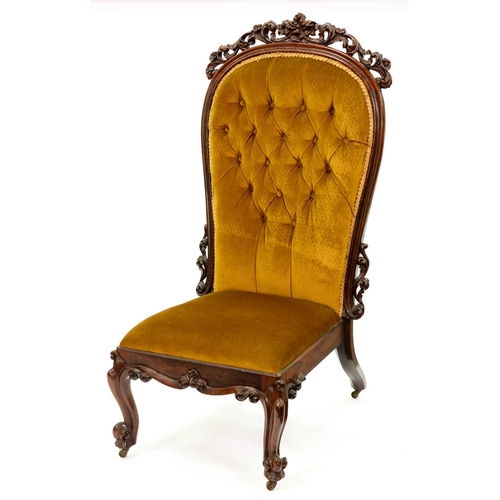 A Victorian rosewood nursing chair,