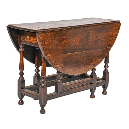 An oak gateleg table, 18th c, the turned
