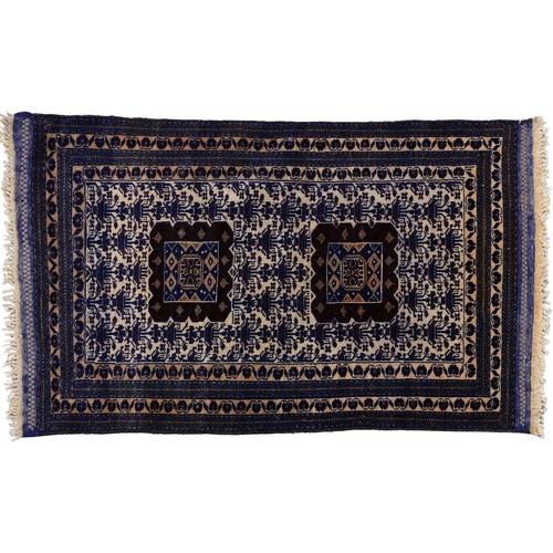 A Persian tribal Baluch rug, 131cm