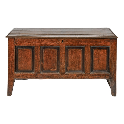 An oak chest, early 18th c, with raised-and-fielded