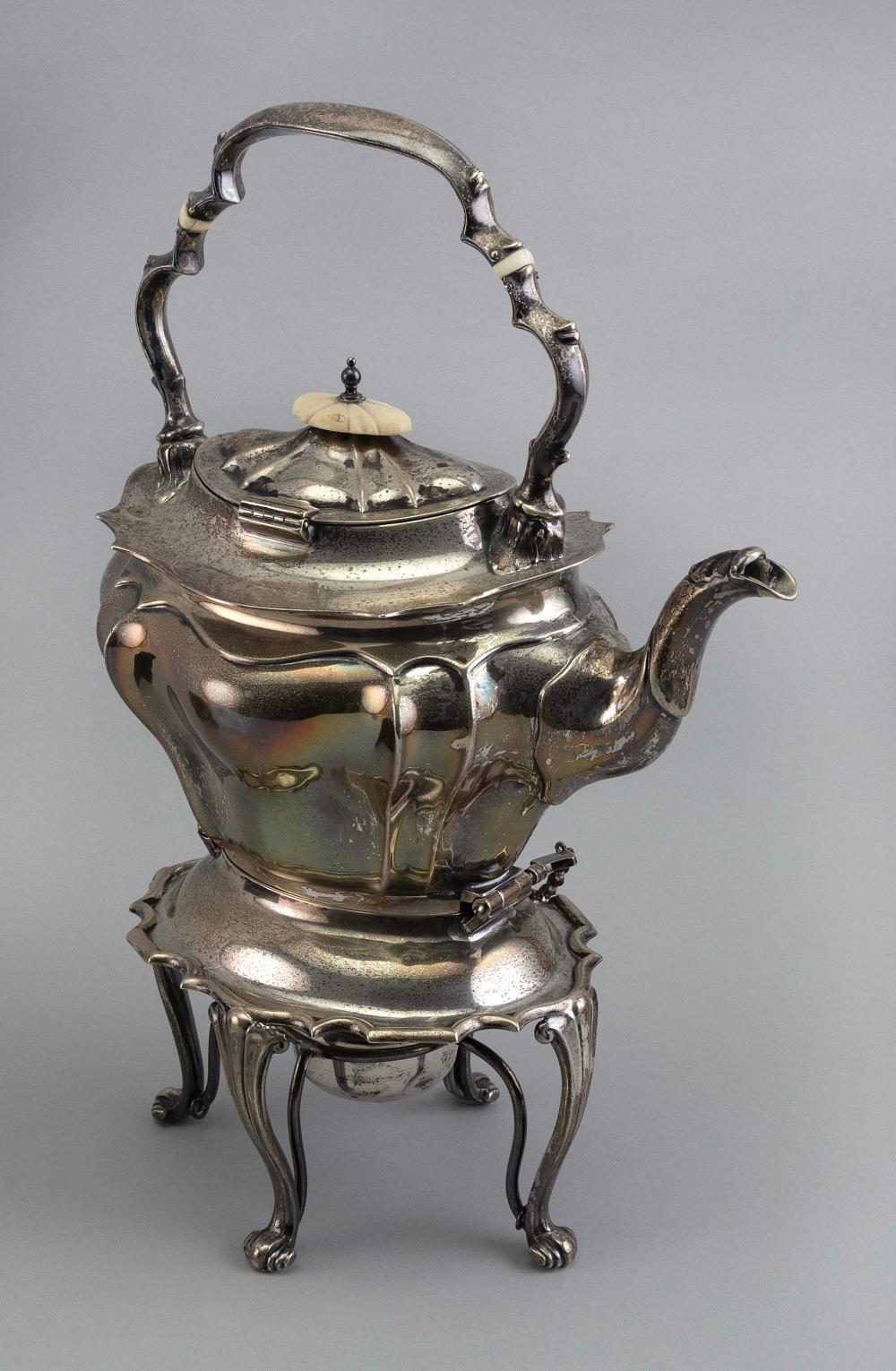 STERLING SILVER TEAPOT ON WARMING STAND