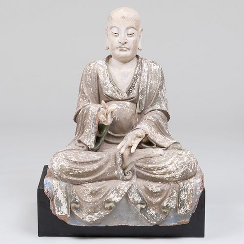 CHINESE STUCCO FIGURE OF A SEATED 3b1e80