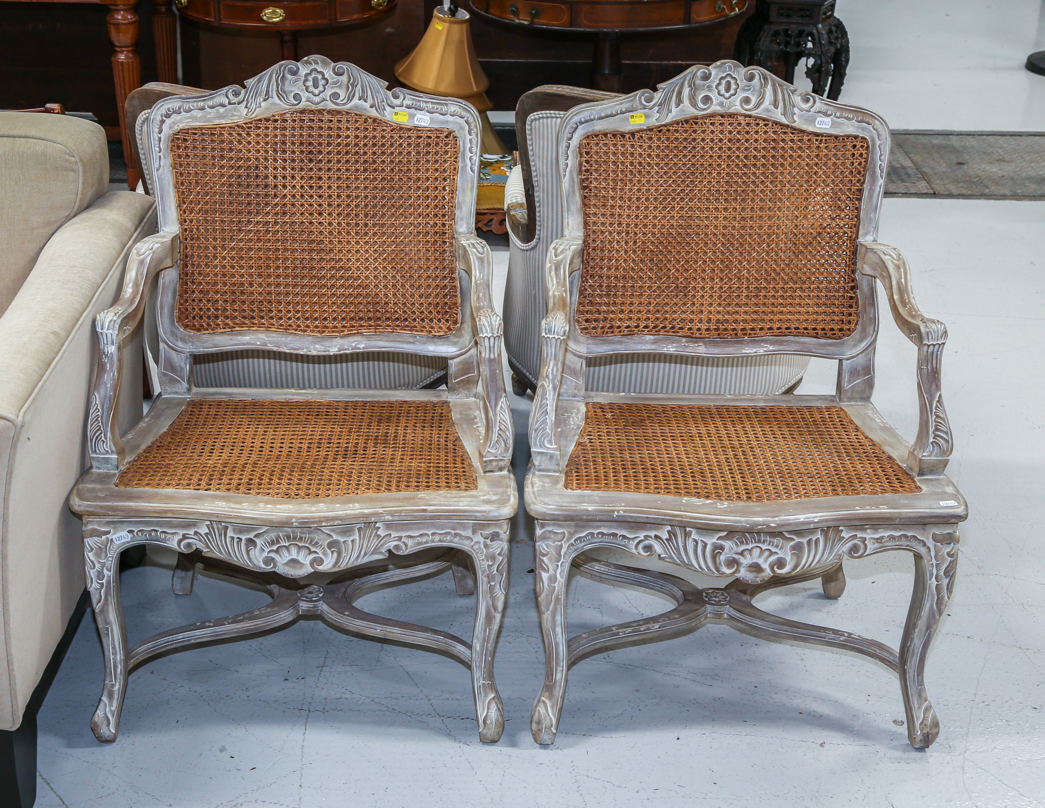 A PAIR OF FRENCH PROVINCIAL CANE