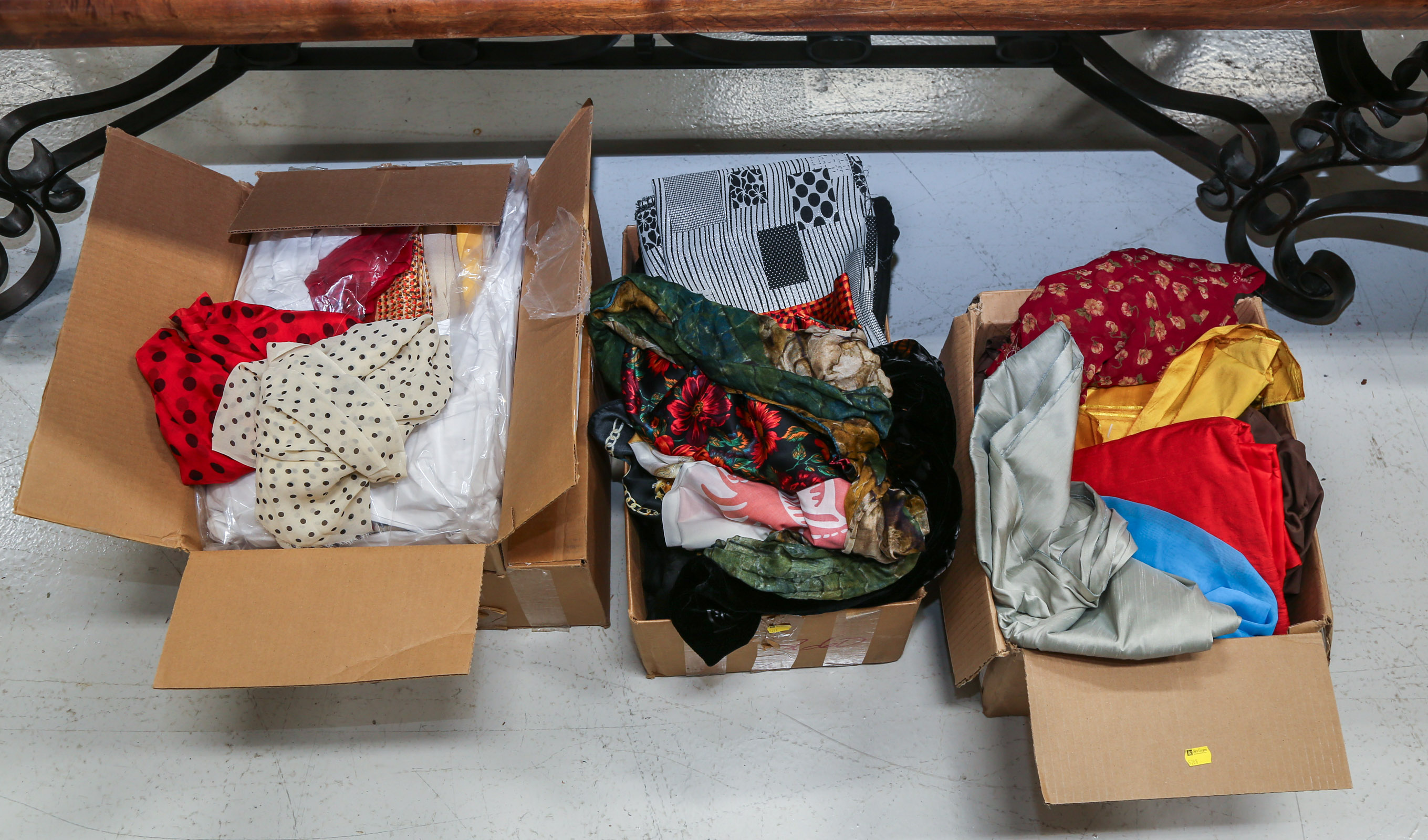 FOUR BOXES OF ASSORTED FABRICS