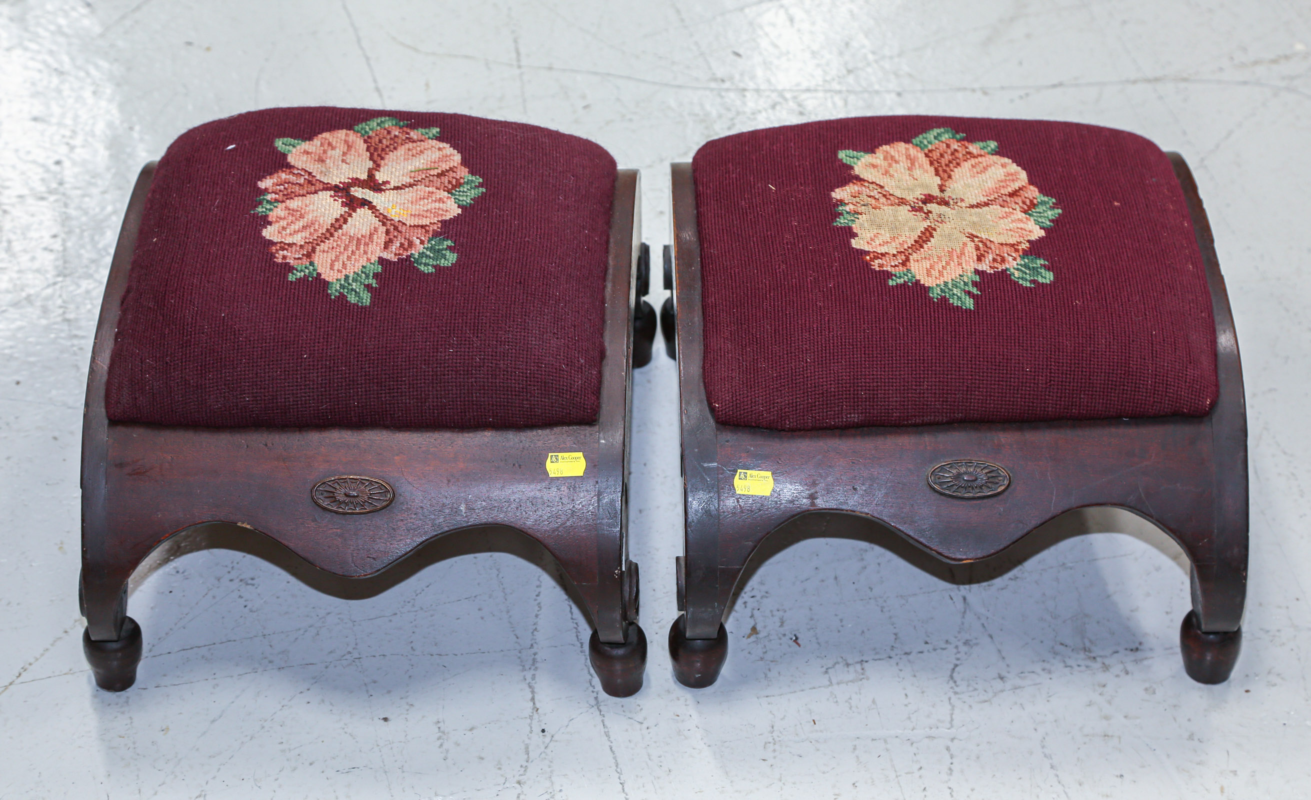 A PAIR OF MAHOGANY FOOT STOOLS