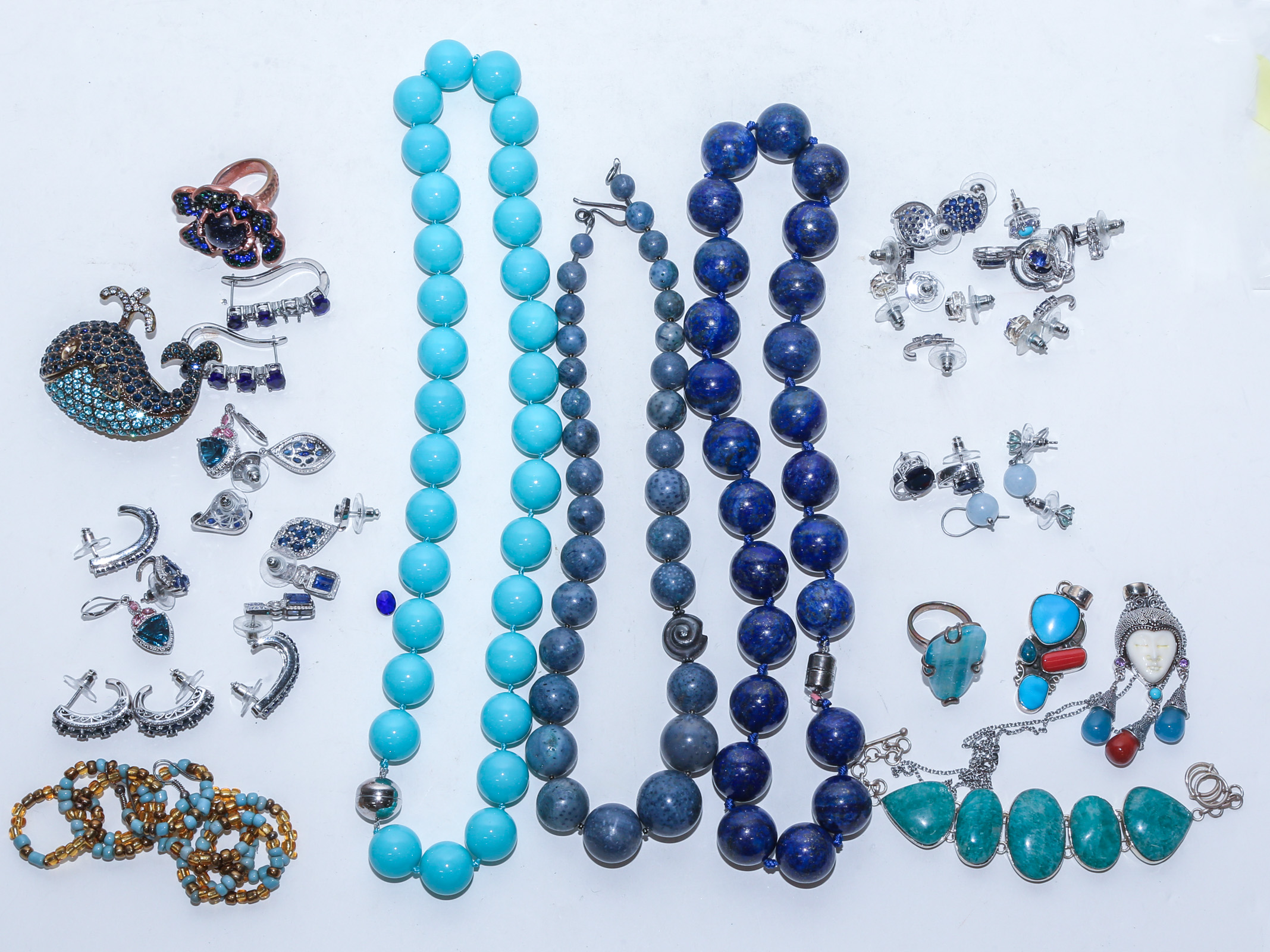 A COLLECTION OF CERULEAN JEWELRY