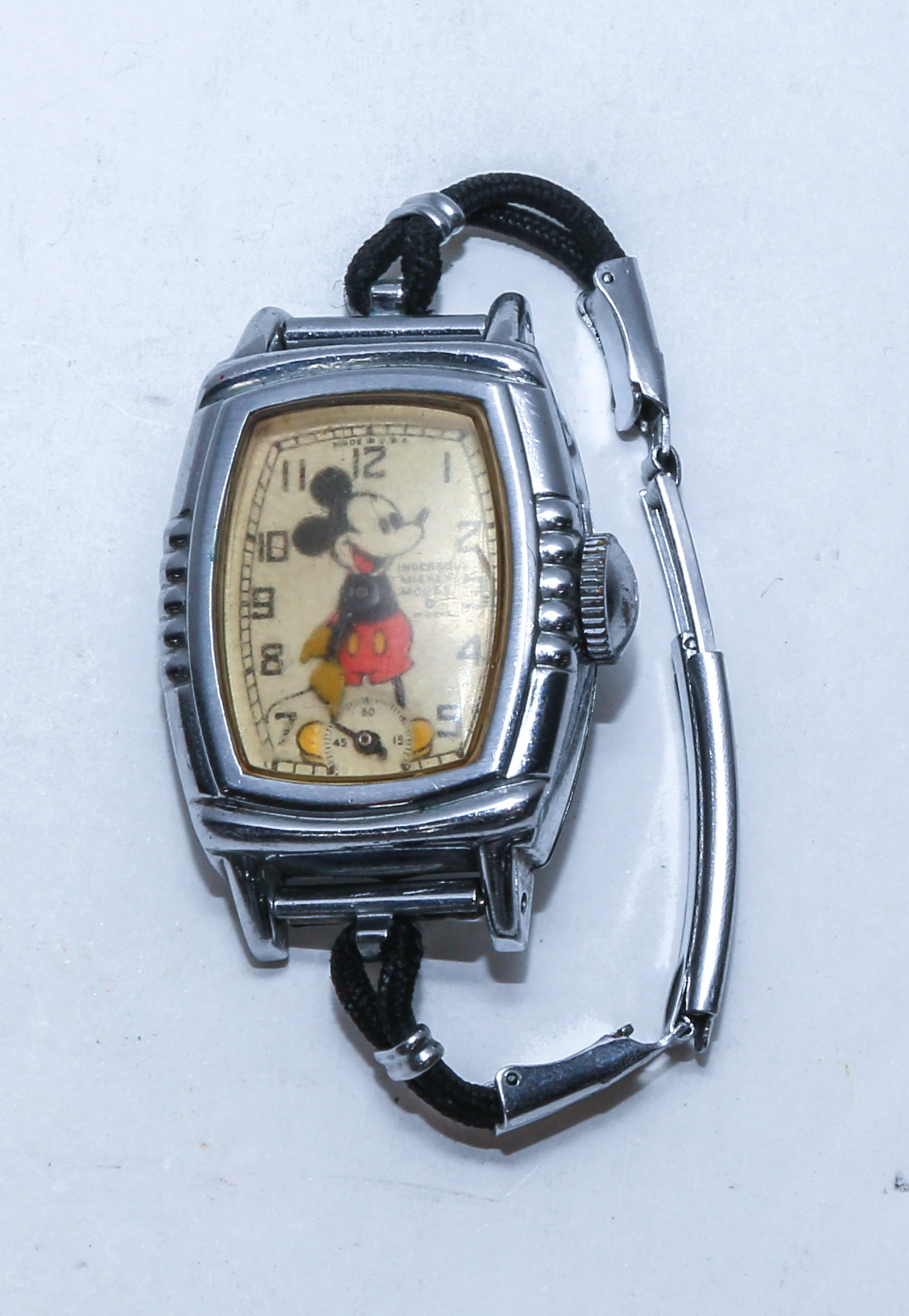 A MICKEY MOUSE WATCH BY INGERSOLL