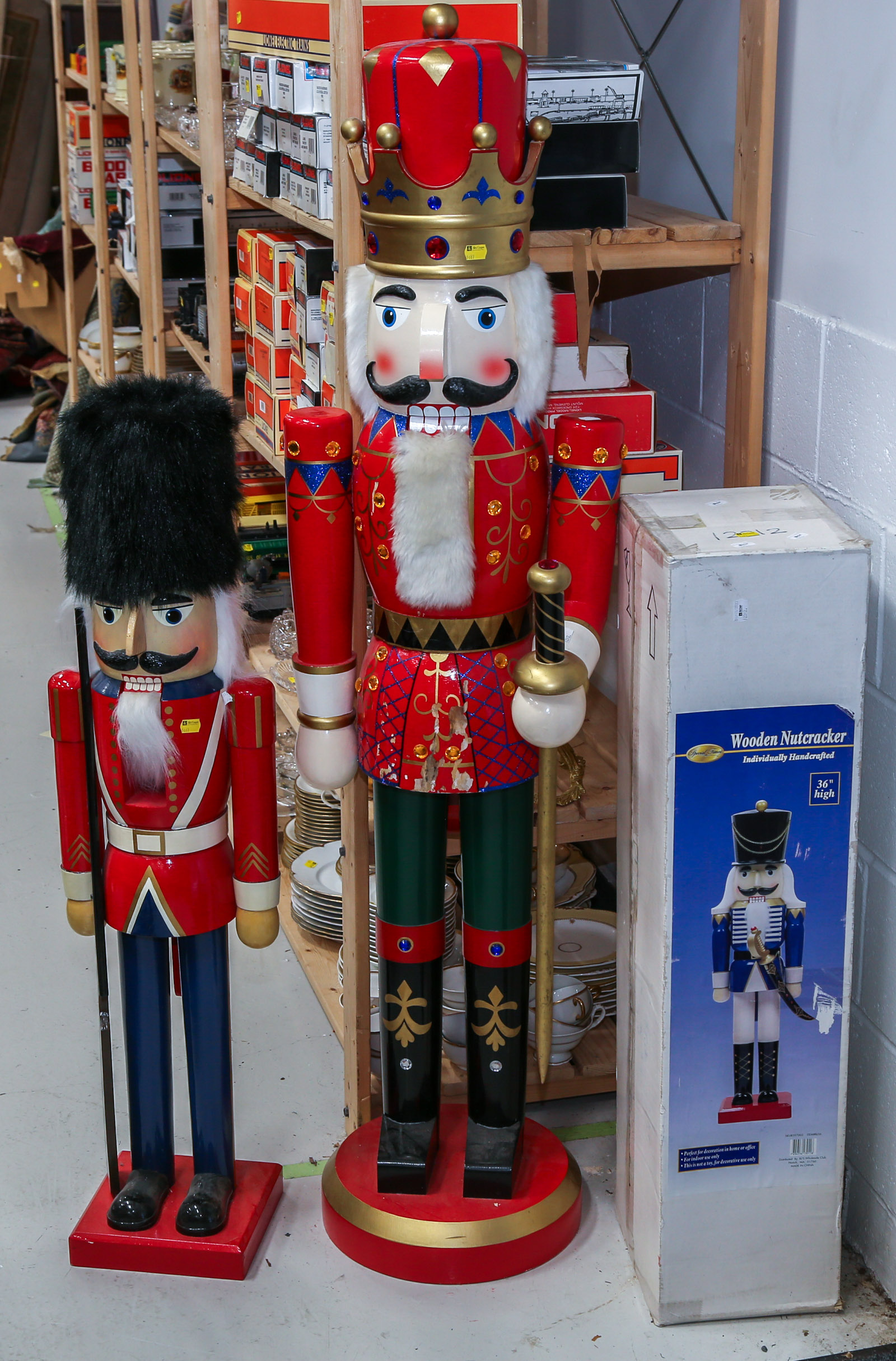 THREE LARGE WOODEN NUTCRACKERS