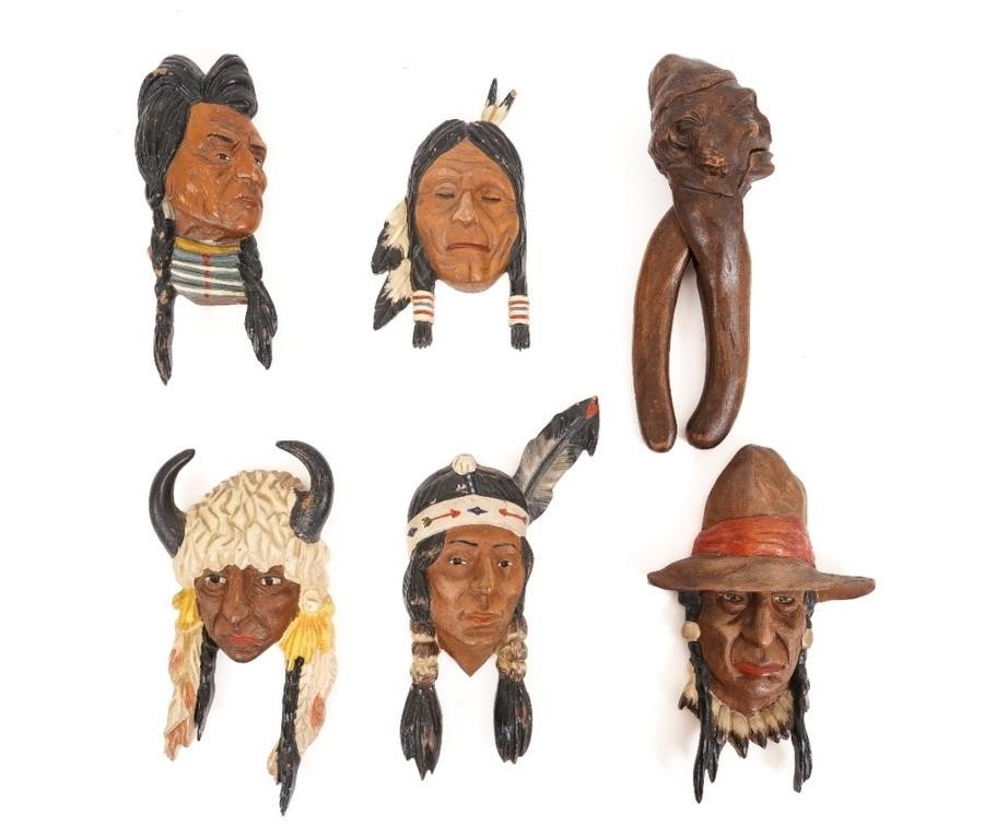 Five wood carved American Indian reliefs,