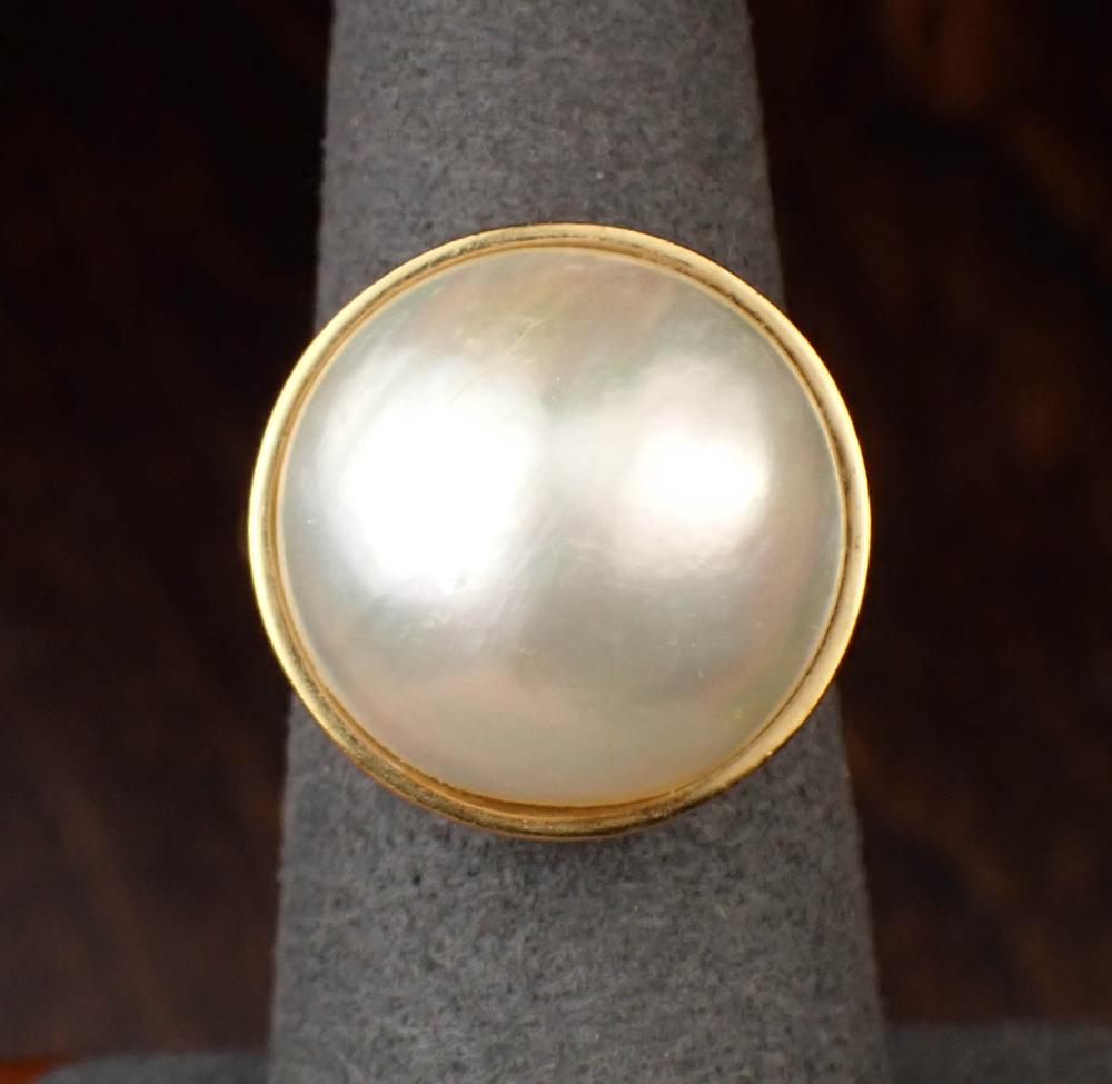 MABE PEARL AND EIGHTEEN KARAT GOLD