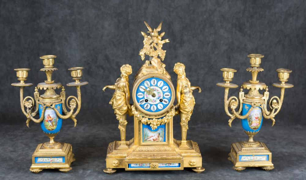 THREE-PIECE GILT BRONZE AND PORCELAIN